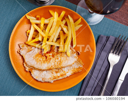 Fried barbecue pork meat with baked potato Fried barbecue pork meat with baked potato 106080194