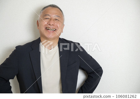 A smiling man in his 50s wearing a jacket A smiling man in his 50s wearing a jacket 106081262
