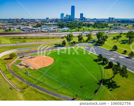 Aerial view of the baseball court with downtown skyline Aerial view of the baseball court with downtown skyline 106082756