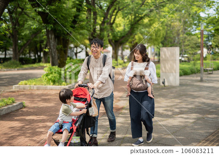 Families walking in the park Families walking in the park 106083211