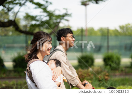 Profile of a family walking in the park Profile of a family walking in the park 106083213