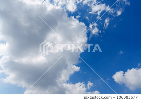 Puffy clouds. Clouds and dark blue skys background textures 106083677