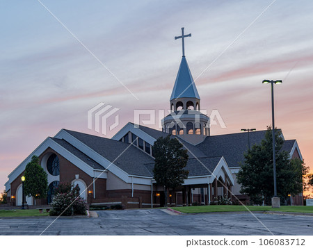 Sunset view of the St Monica Catholic Church 106083712