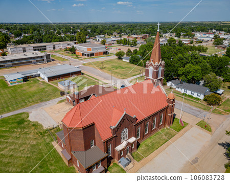 Aerial view of the Saint Rose of Lima Catholic Church and Perry town cityscape Aerial view of the Saint Rose of Lima Catholic Church and Perry town cityscape 106083728