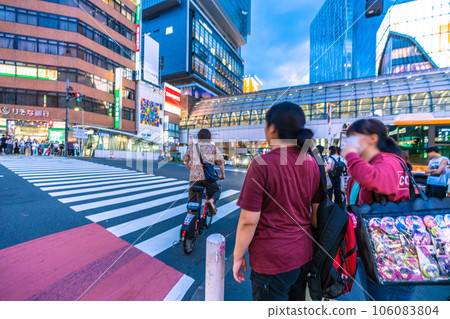 Tokyo cityscape in Japan Running backwards…. Crossing the pedestrian crossing ... Anything is possible ... = Shibuya 106083804