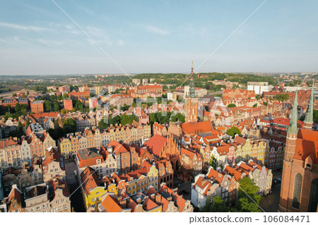 St Mary's Cathedral Beautiful panoramic architecture of old town in Gdansk, Poland at sunrise. Aerial view drone pov. Landscape cityscape City from Above. Small vintage historical buildings Europe 106084471