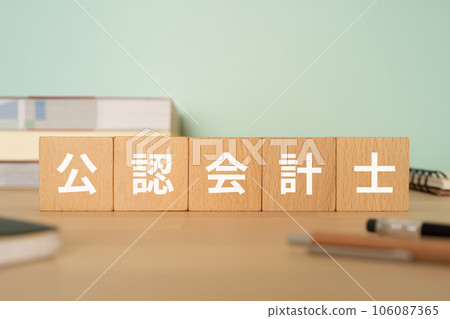A desk with a block that says CPA 106087365