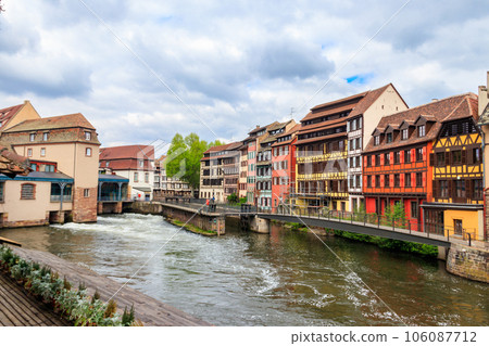 Traditional half-timbered houses on the canals district Petite France in Strasbourg, Alsace, France. UNESCO World Heritage Site Traditional half-timbered houses on the canals district Petite France in Strasbourg, Alsace, France. UNESCO World Heritage Site 106087712