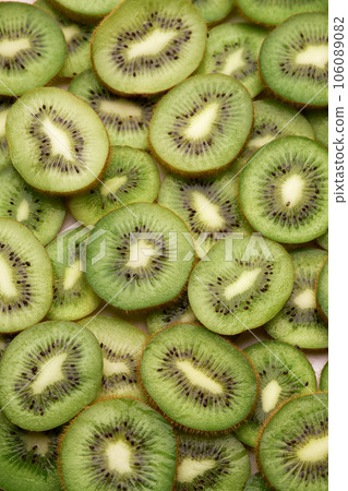 top down background view made of Fresh Sliced organic kiwi close-up 106089082