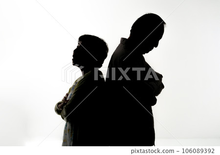 Senior couple silhouette worried Senior couple silhouette worried 106089392