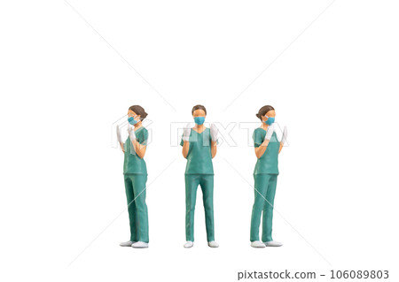 Miniature people young doctor in scrubs Isolated on white background with clipping path 106089803