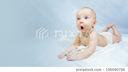 a baby with a hemangioma on his neck lies on a blue background a baby with a hemangioma on his neck lies on a blue background 106090786
