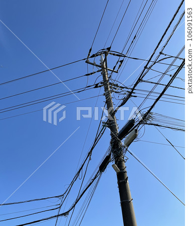 Telegraph pole against the blue sky Telegraph pole against the blue sky 106091563