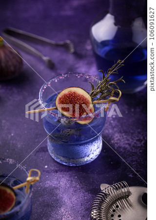 Purple fig cocktail or mocktail in glass Purple fig cocktail or mocktail in glass 106091627