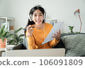 Homeschooling. Asian girl online learn video conference via internet with tutor on computer 106091809