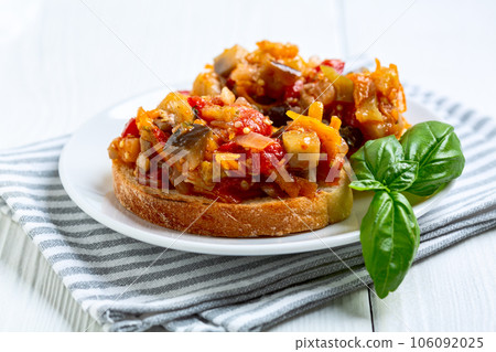 Bruschetta with roasted vegetables. 106092025