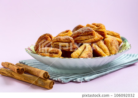 Homemade cottage cheese cookies with sugar and cinnamon. 106092032