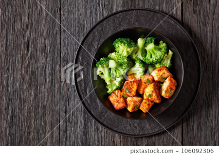 baked salmon bites with steamed broccoli florets baked salmon bites with steamed broccoli florets 106092306