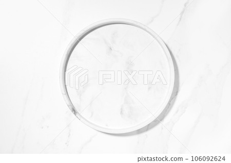 Beauty cosmetics product presentation flat lay mockup scene with white marble circle plate on white marble table with copy space. 106092624