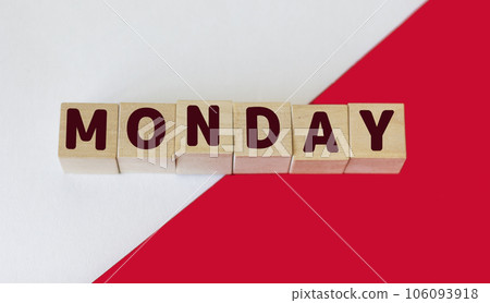 The word Monday on wooden cubes. Weekday business concept. The word Monday on wooden cubes. Weekday business concept. 106093918