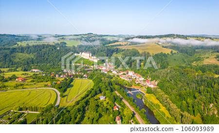 Cesky Sternberk castle and town on sunny summer morning. Aerial view from drone. 106093989
