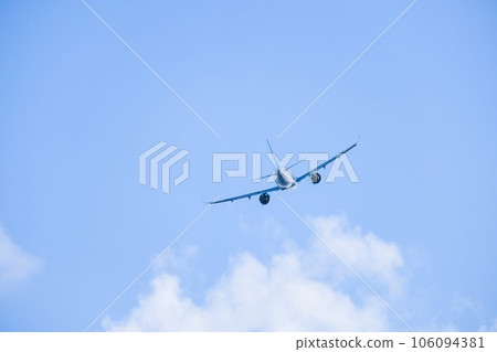 Airplane taking off with blue sky 106094381