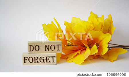 Don't forget something on the wooden blocks and light background. In the background Don't forget something on the wooden blocks and light background. In the background 106096008