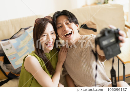 A good couple who takes a selfie before going on a trip A good couple who takes a selfie before going on a trip 106096187