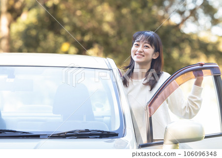 Woman enjoying a drive Woman enjoying a drive 106096348