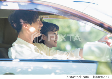 A couple enjoying drive A couple enjoying drive 106096357