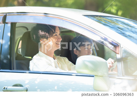 A couple enjoying drive 106096363