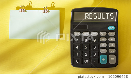 Success concept with the word Result on a calculator and yellow background. Next sticker to write Success concept with the word Result on a calculator and yellow background. Next sticker to write 106096438