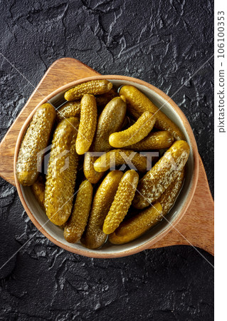 Pickled cucumbers. Fermented food. Homemade canned gherkins. Top shot 106100353