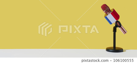 microphone patterned with the flag of france, banner 106100555