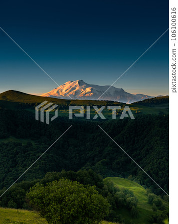 magnificent bright view of elbrus in summer from the neighboring valley magnificent bright view of elbrus in summer from the neighboring valley 106100616