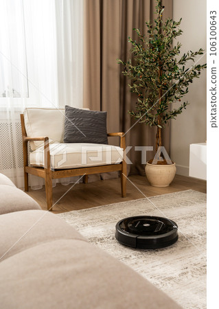 Robot vacuum cleaner photo from the bottom point in the living room Robot vacuum cleaner photo from the bottom point in the living room 106100643