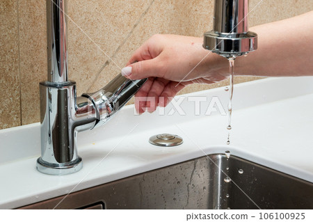 The concept of lack of tap water. The faucet has no running water 106100925