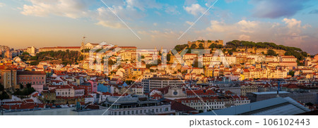 View of Lisbon city from Miradouro de Sao Pedro de Alcantara viewpoint on sunset. Lisbon, Portugal. 106102443