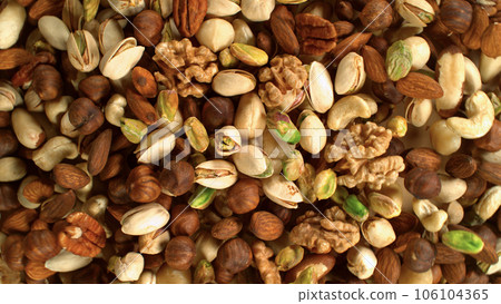 Freeze Motion Shot of Flying Various Nuts 106104365