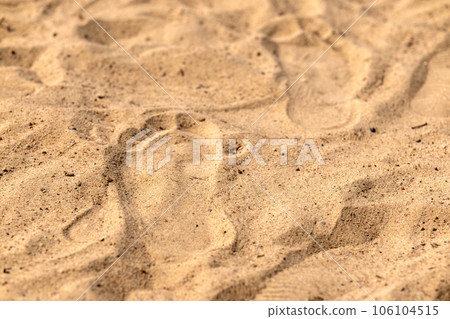 Human footprint in the sand. Footprint on the beach 106104515