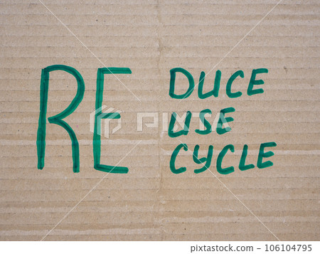 Written words reduce, reuse and recycle on cardboard. Written words reduce, reuse and recycle on cardboard. 106104795