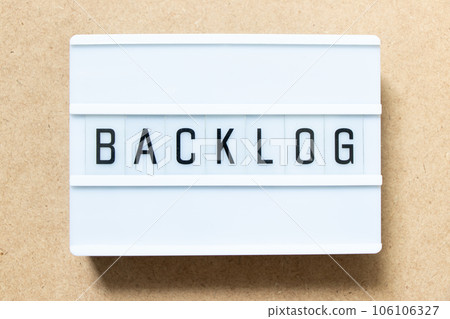 Lightbox with word backlog on wood background Lightbox with word backlog on wood background 106106327