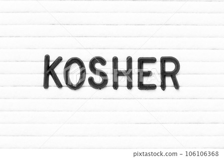 Black color letter in word kosher on white felt board background Black color letter in word kosher on white felt board background 106106368