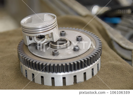 Close up scene the aluminum piston and clutch set parts. 106106389