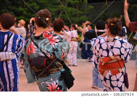 Bon dance in a yukata Bon dance in a yukata 106107914