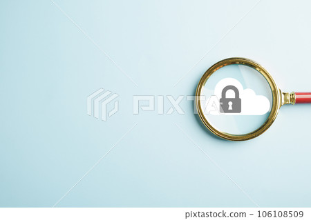 Magnifying glass zooms in on cloud big data, showcasing digital network connection and modern communication. Innovative online backup with secure protection. Illustrating the cloud computing concept. 106108509