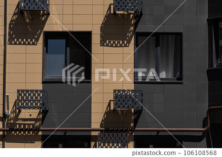 Facade of a modern residential building, building texture Facade of a modern residential building, building texture 106108568