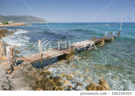 Serene Seaside Decay: Pier and Waves, Crete Malia Beach - Crete - July - 2023 Serene Seaside Decay: Pier and Waves, Crete Malia Beach - Crete - July - 2023 106109303