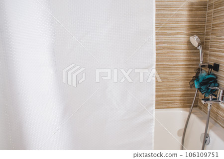 An interior bathroom table with a white mosaic tiles wall. Background for design products. Wall tiles. An interior bathroom table with a white mosaic tiles wall. Background for design products. Wall tiles. 106109751