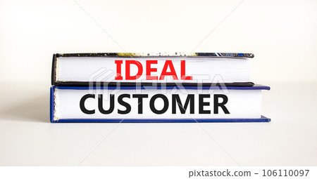 Ideal customer symbol. Concept words Ideal customer on beautiful books. Beautiful white table white background. Business ideal customer concept. Copy space. 106110097